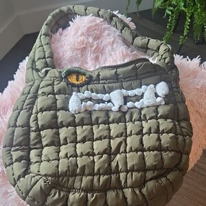 Quilted Olive Green Handbag with Eye Detail